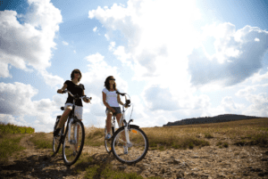 two girls on bikes