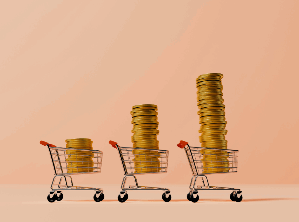 three grocery carts with stacks of change in them
